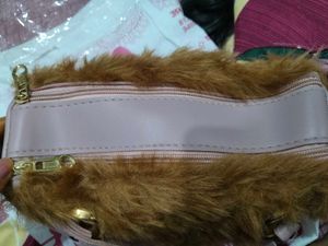 brown fur sling bag
