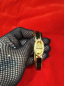 Elegant Gold &amp; Black Bangle Bracelet