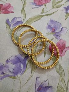 Elegant Pearl and Kundan Bangles Set
