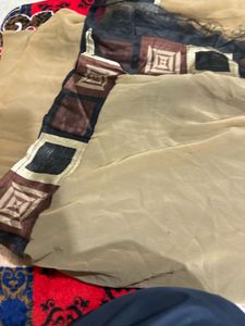 elegant brown and black clasical saree