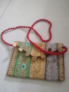 Embroidered Clutch with Coin Detail