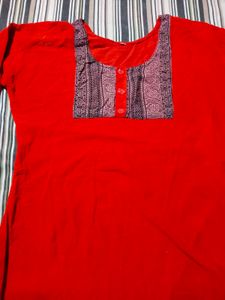 Vibrant Red Kurta with Intricate Neckline