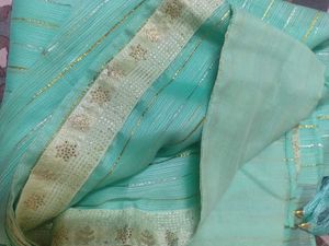 Elegant Teal Saree with Gold Stripes