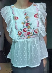 Embroidered White Peplum Top