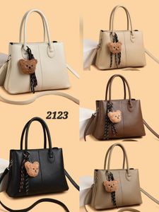Chic Black Tote Bag with Bear Charm