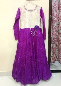 Elegant Purple Gown with Pearl Embellishments