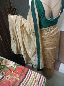 Elegant Golden Saree with Unique Print