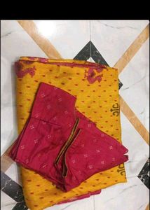 Vibrant Yellow Saree with Pink Blouse Piece
