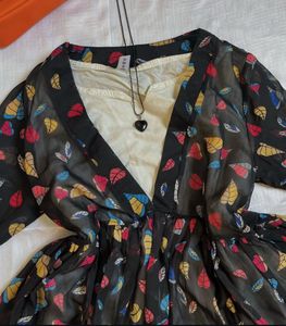 Sheer Black Blouse with Colorful Leaf Print