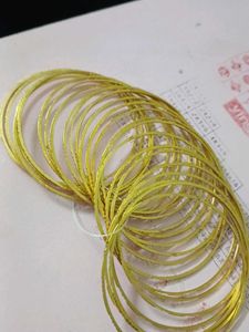 Set of Gold-Toned Bangles