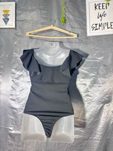 Chic Black Off-Shoulder Bodysuit