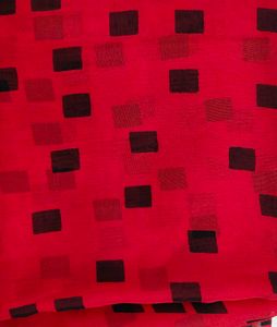Vibrant Red Saree with Black Diamond Print