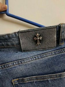 Chrome Hearts cross patch graphic blue jeans