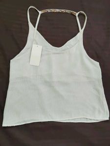 White camisole with beaded detail