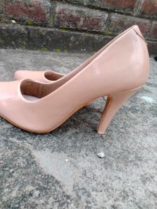 Elegant Nude Patent Leather Stilettos