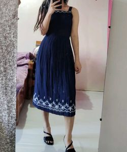 Navy Dress with Embroidery details.