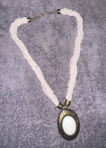 Elegant Beaded Necklace with Statement Pendant