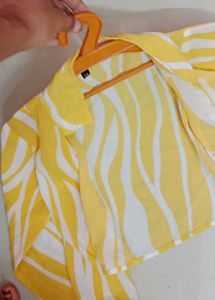 yellow dress with over coat
