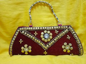 Dark maroon Fancy Clutch...