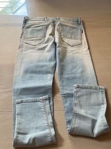 Light Wash Distressed Denim Jeans