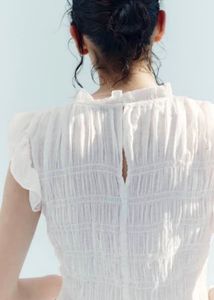 Chic White Smocked Top