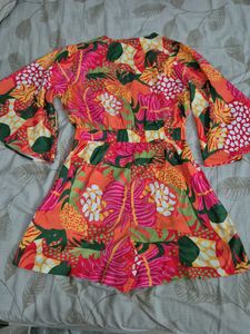Vibrant Floral Wrap Romper