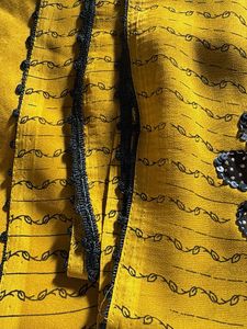 Yellow Saree with Floral Embellishments