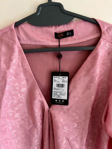 Tie on the romance in satin rose.