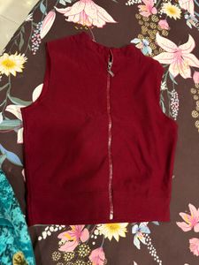 Chic Burgundy Sleeveless Top with Gold Accent
