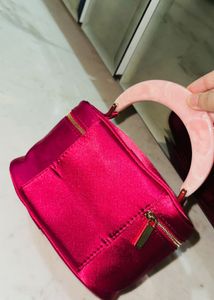 carolina herrera Chic Pink Satin Vanity Bag