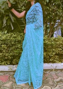 Stunning Teal Lace Saree with Pearl Embellishments