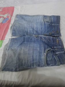 Distressed Blue Denim Jeans