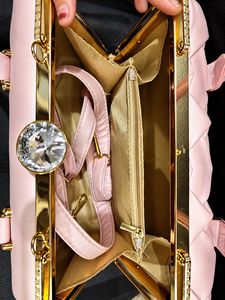 Elegant Pink Woven Clutch Bag