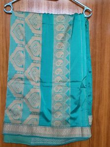 Elegant Green Silk Saree with Intricate Border