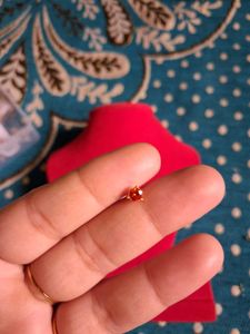 beautiful orange color nosepin  gold