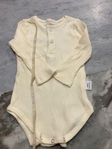 Cream Ribbed Long Sleeve Bodysuit