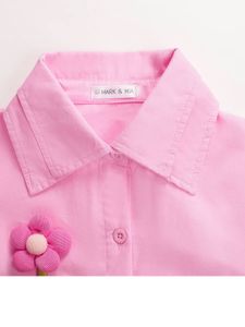 pink shirt with white skirt