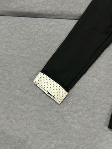 Classic Black Blazer with Polka Dot Lining