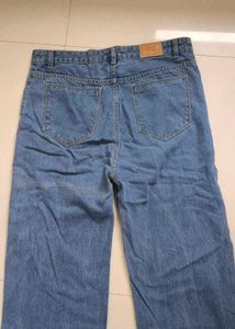 Ripped Wide Leg Denim Jeans