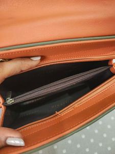 Chic Two-Tone Handbag with Gold Handle
