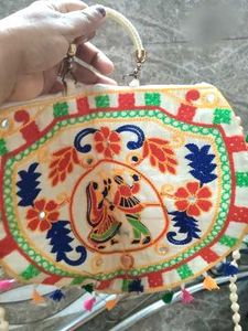 Embroidered Clutch Bag with Tassels