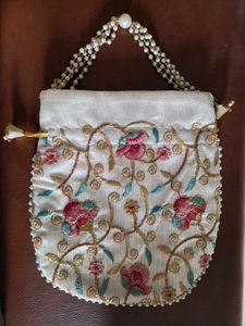 Embroidered Clutch with Pearl Handle