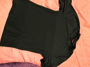 Womens Blue Jeans and green fitted top