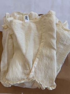 beige cute ruffle top