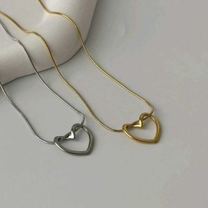 ✨ Elegant Heart Knot Pendant 💖