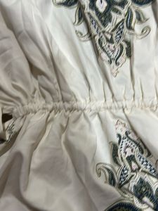 Elegant White Embroidered Gown