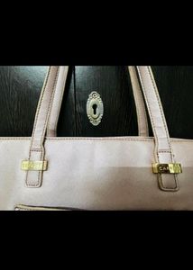 Caprese Women Pink Solid Structured Shoulder Bag