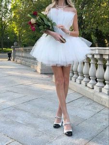 Elegant White Tulle Strapless Dress with Bow Detai