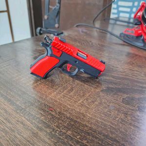 Toy Gun keychain  with blow back action- Red and B
