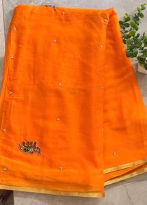 Vibrant Orange Embellished Saree